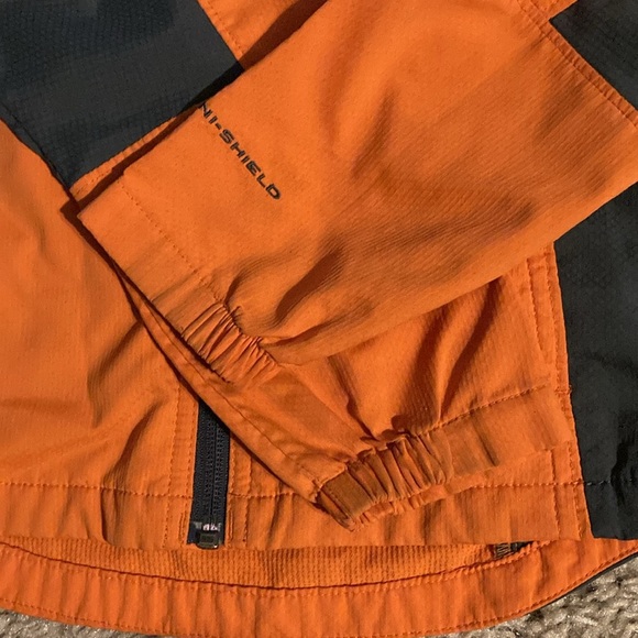Columbia orange and grey jacket with a few marks on the cuff. - Picture 4 of 8